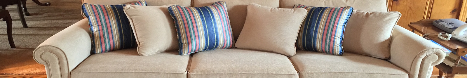 reupholstered 6 cushion sofa