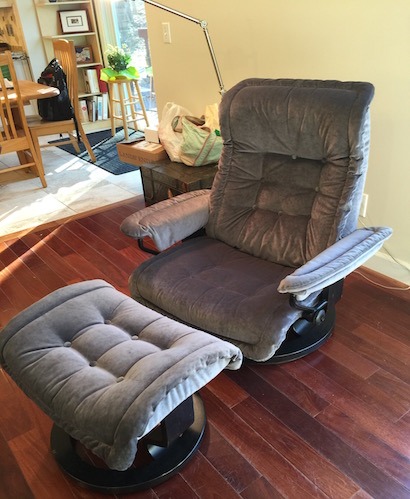 reupholstered recliner chair and ottoman